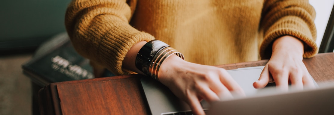 person using laptop computer